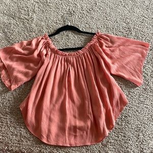 Blouse with buttons down the “back”